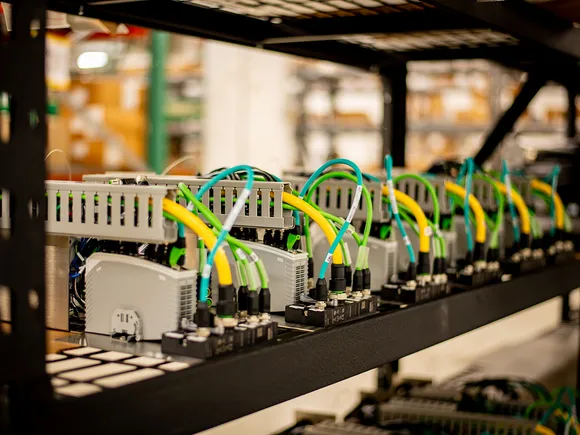 A close view of neatly routed wires and electrical terminal components in an assembly.